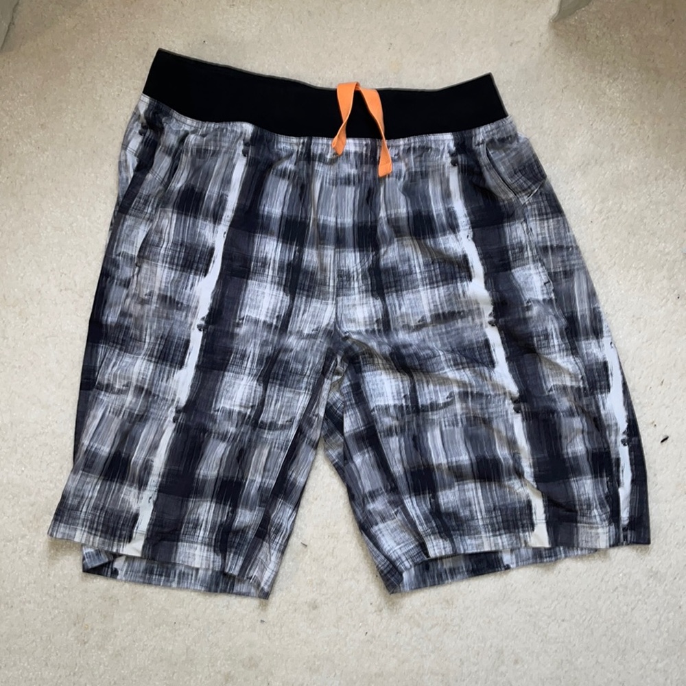 Large, white and black checkered Lululemon athletic shorts